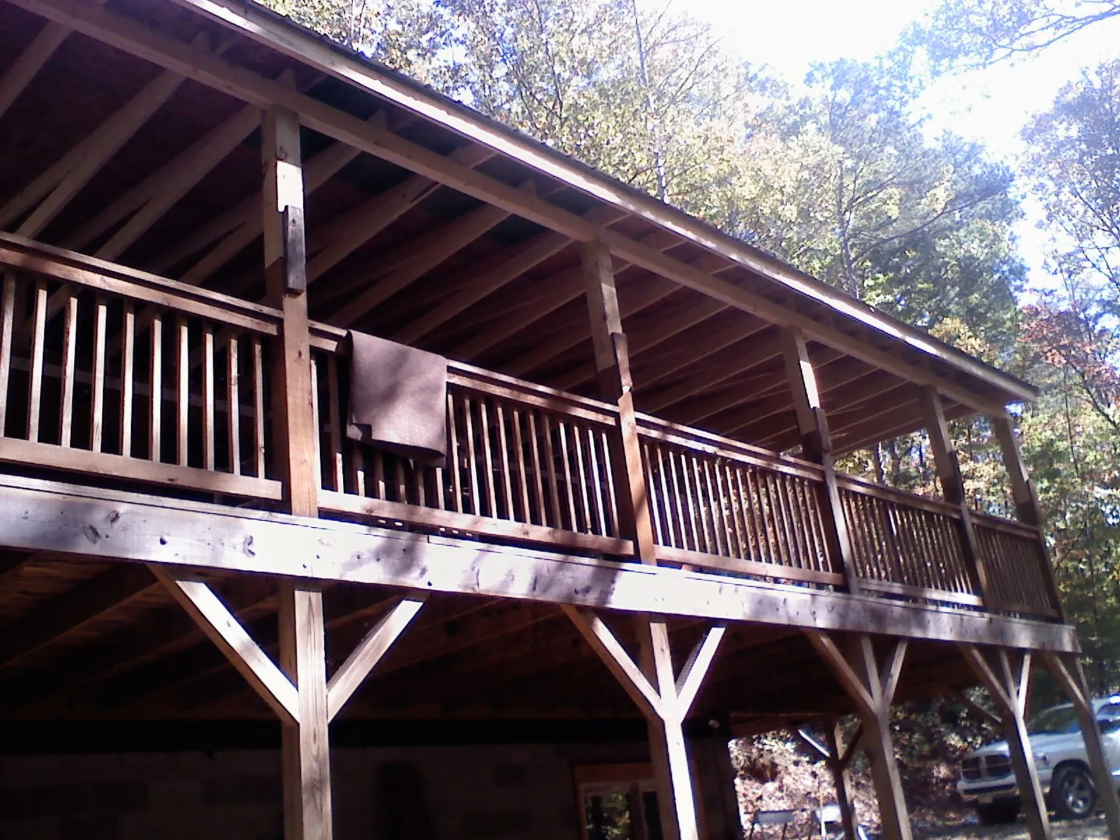 Timber framing under a new elevated porch and deck — Roof Leak Repair in Commack by Roofing Brothers